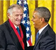  ?? ASSOCIATED PRESS FILE PHOTO ?? President Barack Obama laughs with Frank Deford as he awards him the 2012 National Humanities Medal during a ceremony in the East Room of the White House in Washington. Deford, an award-winning sports writer and commentato­r, died Sunday.