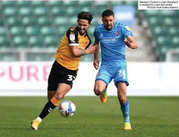  ??  ?? Newport County’s Liam Shephard is tackled by Liam Sercombe
Picture: Huw Evans Agency