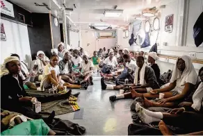  ??  ?? HAVEN Women and children on board the MSF vessel Aquarius