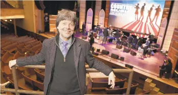  ?? MARK HUMPHREY/AP ?? Filmmaker Ken Burn poses in the Ryman Auditorium March 27, in Nashville, Tenn. The Ryman was home to the Grand Ole Opry from 1943 to 1974.