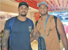  ?? Photo: Anasilini Ratuva ?? From left: Brive winger Sevanaia Galala and Akuila Tabualevu at Nadi Internatio­nal Airport on June 28, 2017.