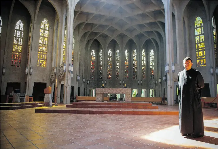  ?? RIC ERNST/ POSTMEDIA NEWS ?? Father Alban Riley at the Westminste­r Abbey in Mission, B.C., which was built in the 1950s. The Catholic monastery is home to 32 monks.