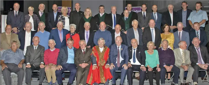  ??  ?? Team members and guests with Wexford Mayor Tony Dempsey, GAA president John Horan, Bishop Denis Brennan and officials.
