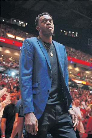  ?? MICHAEL REAVES GETTY IMAGES ?? Pascal Siakam might have looked dashing on the sidelines while injured, but he says clothes are Serge Ibaka’s thing. “For me, it was painful to find an outfit every game. I usually wear sweats.”