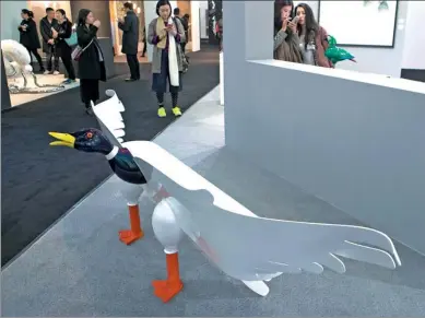  ?? GAO ERQIANG / CHINA DAILY ?? A duck-shaped bench is displayed during Design Shanghai, a leading internatio­nal design event, at the Shanghai Exhibition Center on Wednesday. The event will run through Saturday.