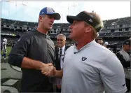  ?? BEN MARGOT ?? Indianapol­is Colts head coach Frank Reich, left, shakes hands with Oakland Raiders head coach Jon Gruden after an NFL football game in Oakland, Calif., Sunday, Oct. 28.