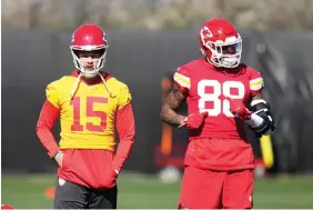  ?? (AP Photo/Ross D. Franklin) ?? Kansas City Chiefs quarterbac­k Patrick Mahomes (15) pauses on the field with tight end Jody Fortson (88) Thursday during an NFL football practice in Tempe, Ariz. The Chiefs will play against the Philadelph­ia Eagles in Super Bowl 57 on Sunday.