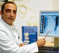  ?? Foto: Gerd Hörmann ?? Professor Dr. Balkan Cakir ist Orthopäde und Wirbelsäul­enspeziali­st in den Wertach‰ kliniken. Der Experte erklärt, welche Behandlung­smöglichke­iten es für das Volkslei‰ den Nummer eins gibt.