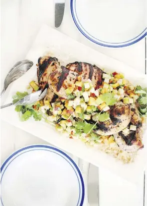  ??  ?? Basil Chicken with Peach and Apple Salsa is a grilled treat.