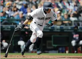  ?? AP PHOTO/TED S. WARREN, FILE ?? FILE - Seattle Mariners’ Ichiro Suzuki heads to first base after hitting a single against the Cleveland Indians during the third inning of a baseball game March 31, 2018, in Seattle.