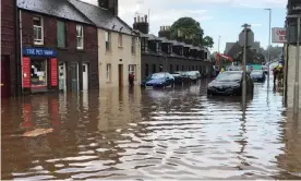  ?? Photograph: Martin Anderson/PA ?? Flooding in Stonehaven on Wednesday.