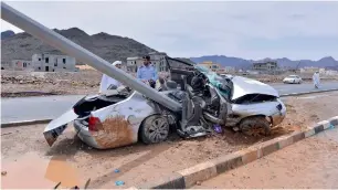  ??  ?? The speeding car on wet roads crashed into lamp post and the three young men died on the spot.