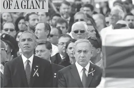  ?? ABIR SULTAN / THE ASSOCIATED PRESS ?? U.S. President Barack Obama stands alongside Israeli Prime Minister Benjamin Netanyahu before the flag-draped coffin of former Israeli president Shimon Peres during his state funeral in Jerusalem on Friday. Thousands of admirers and dozens of foreign...