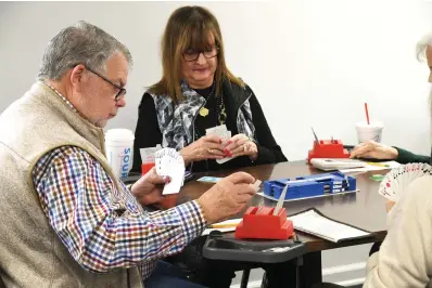  ?? The Sentinel-Record/Lance Brownfield ?? ■ Members of the Hot Springs Duplicate Bridge Club begin a game Thursday at noon.