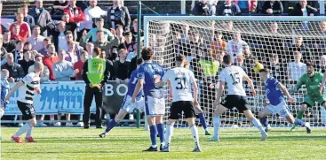  ?? ?? On target McInroy’s strike is deflected past Josh Rae