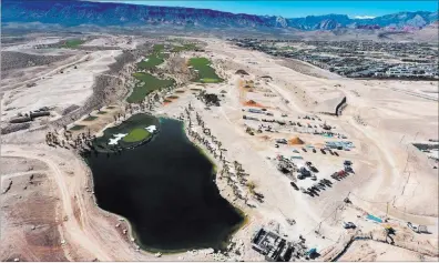  ?? MICHAEL QUINE/ LAS VEGAS REVIEa-JOURNAL @VEGAS88S ?? An aerial view shows an 18-hole championsh­ip golf course, designed by Tom Fazio, that will be linked to The Summit, a new luxury residentia­l community in Summerlin. The course would be the first new one to debut in Southern Nevada in several years.
