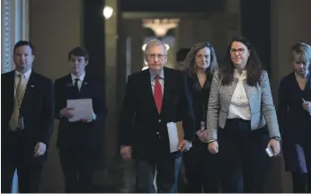  ?? AP ?? Senate majority leader Mitch McConnell on his way to the chamber on the first morning of a government shutdown after a divided United States senate rejected a funding measure