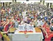  ?? ANI ?? Schoolchil­dren pay homage to two-year-old Sujith Wilson, who died in an abandoned borewell in Tiruchirap­palli on Tuesday.