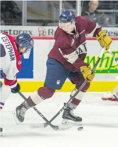  ?? BRANDON HARDER ?? The Regina Pats’ Cale Fleury, right, battles for the puck with the Lethbridge Hurricanes’ Giorgio Estephan during Saturday’s game at the Brandt Centre. Estephan had a goal as Lethbridge won 6-2.