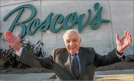  ?? DIGITAL FIRST MEDIA FILE PHOTO ?? Retail icon Albert Boscov passed away in Feb. 2017 at the age of 87. In this file photo, Boscov stands in front of the Exeter Boscov’s store in 2014 — to mark the retail chain’s 100th anniversar­y.