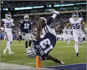  ?? ADAM HUNGER — THE ASSOCIATED PRESS ?? Cowboys wide receiver Michael Gallup stays in bounds as he flips over the goal line to score a touchdown against the New York Giants during the fourth quarter Monday.