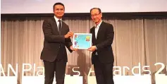  ??  ?? Farid (left) receives the award from Somsak at the 3rd Asean Plastic Awards 2018 gala dinner in Bangkok, Thailand.