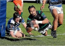  ?? PHOTO: JOHN BISSET/STUFF ?? South Canterbury wing Kalavini Leatigago scores a brilliant individual try against Wanganui as his side upset the defending champions.