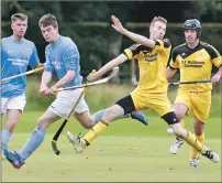  ?? Photograph: Stephen Lawson. ?? Inveraray’s Ally Munro tries to get his block in on Caberfeidh’s Craig Morrison during the National Division game at the Winterton last Saturday.