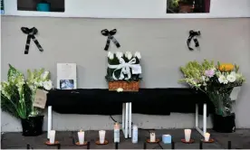  ?? Photograph: Claudio Cruz/ AFP/Getty Images ?? An improvised altar set up by employees of the restaurant owned by Baptiste Lormand after he was found murdered in Mexico City on 28 November.