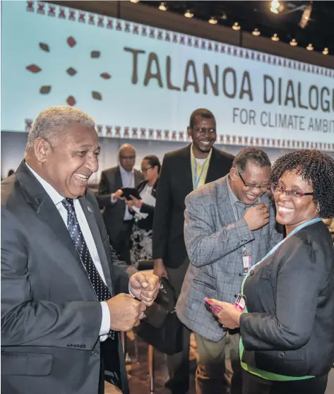  ?? Photo: ?? Prime Minister Voreqe Bainimaram­a with participan­ts during the Presidenci­es Talanoa Dialogue in Bonn, Germany.