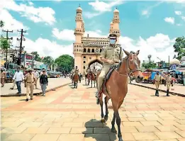  ?? — DC ?? Hyderabad police commission­er Anjani Kumar leads a horse-mounted patrol of the Old City near Charminar, in this file picture.