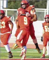  ?? MATT BATES — ENTERPRISE-RECORD ?? Chico’s Bryce Darlington (55) celebrates with Dion Coleman (9) after a touchdown Friday against Las Plumas in Chico.