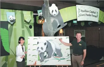  ?? PROVIDED TO CHINA DAILY ?? Cultural Counselor of the Chinese embassy in Singapore Qin Wen (left) and Group CEO of Mandai Wildlife Group Mike Barclay take part in the River Wonders wildlife park’s farewell event for giant panda Le Le in Singapore on Dec 13.
