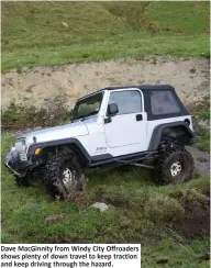  ??  ?? Dave MacGinnity from Windy City Offroaders shows plenty of down travel to keep traction and keep driving through the hazard.