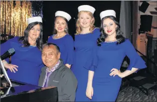  ?? SAM MCNEISH/THE TELEGRAM ?? Cammi Vidal, who was posted to Argentia in 1962, recalls the Windjammer ballroom. He recounted those memories after the final performanc­e of “An Evening with the USO: The Windjammer 1969.” He posed with the Lovely Ladies, comprised of (in back from left) Connie Newhook (Georgia Draper), Erin Murphy (Mary Jo Richardson), Paula Milley (Sally Keeping) and Maggie Follett (Caroline Ledrew).