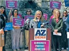  ?? JONATHAN COOPER THE ASSOCIATED PRESS ?? Phoenix Mayor Kate Gallego speaks to reporters at the state Capitol on Wednesday. Arizona’s Supreme Court ruled Tuesday an 1864 law banning abortion under almost all circumstan­ces could be enforced.