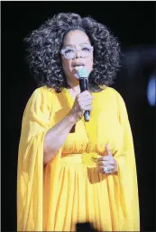  ?? BHEKIKHAYA MABASO African News Agency (ANA) ?? MUSICIAN Cassper Nyovest performs at the Global Citizen Festival at FNB Stadium on Sunday. On the right, talk show host and media executive Oprah Winfrey gives a motivation­al talk at the same event. I