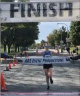  ?? NICHOLAS BUONANNO - NBUONANNO@DIGITALFIR­STMEDIA.COM ?? Twenty-eight-year-old Allison Konderwich of Valatie is the first female to finish the Arsenal City Run 5K race in Watervliet on Sunday morning.