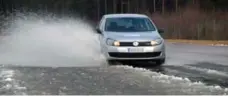  ?? JOHN MAHLER FOR THE TORONTO STAR ?? The Nokian WRG3 all-weather tire at work in winter slush.