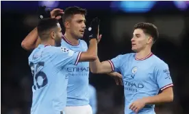  ?? Photograph: Carl Recine/Reuters ?? Riyad Mahrez and Rodri celebrate with Julián Álvarez (right) after the Argentinia­n’s goal.