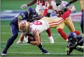  ?? ROSS D. FRANKLIN — THE ASSOCIATED PRESS ?? San Francisco 49ers tight end George Kittle ( 85) is hit by Seattle Seahawks safety Ugo Amadi ( 28) and middle linebacker Bobby Wagner ( 54) during the first half Sunday in Glendale, Ariz.