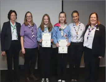  ??  ?? Ella Guerin and Isabel Ryan of Kenmare Guides pictured at the National Guide Awards with their Guide Leaders Elizabeth Carson and Heather Coombs and (left) Irish Girl Guides President Maureen Murphy and (right) IGG Chief Commission­er Helen Concannon.