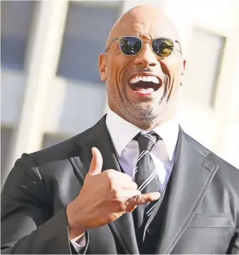  ?? JB LACROIX/ WIREIMAGE ?? Dwayne Johnson has a notoriousl­y busy schedule. Would he have time to be president?