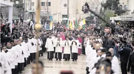  ?? MAJDI MOHAMMED AP ?? Latin Patriarch Pierbattis­ta Pizzaballa walks in Manger Square, adjacent to the Church of the Nativity, believed to be the birthplace of Jesus Christ, in Bethlehem on Saturday.