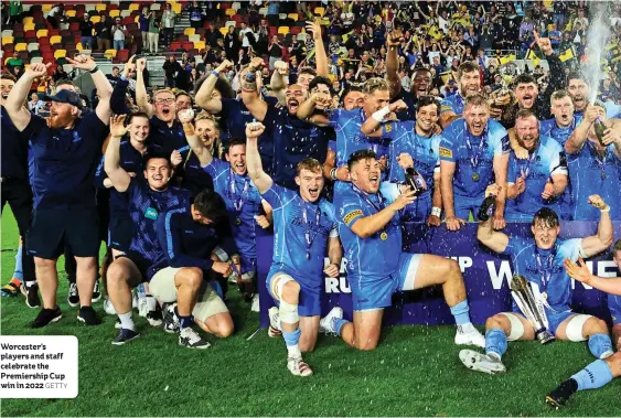  ?? GETTY ?? Worcester’s players and staff celebrate the Premiershi­p Cup win in 2022