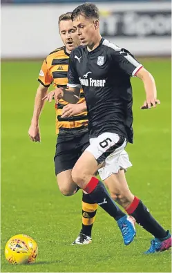  ?? David Young. ?? Max Anderson, above left, holds off Iain Flannigan, while his Dens Park team-mate Callum Moore goes past Thomas Grant.