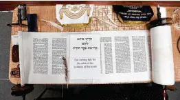  ?? Photos by Joe Center / Contributo­r ?? The Unity Torah was completed after its arrival at The Shul of Bellaire.