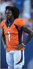  ?? AARON ONTIVEROZ — THE DENVER POST ?? KJ Hamler (1) of the Denver Broncos watches the action against the Minnesota Vikings during the first quarter at Empower Field at Mile High on Saturday, August 27, 2022.