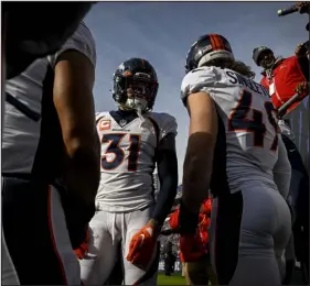  ?? AARON ONTIVEROZ — THE DENVER POST ?? Broncos safety Justin Simmons ( 31) prepares to take the field before the first quarter of last Sunday’s game against the Baltimore Ravens at M& T Bank Stadium.