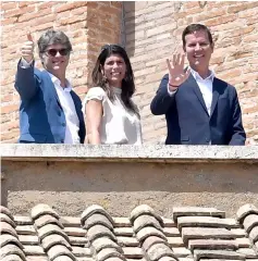  ??  ?? Two of the three Chilean sexual abuse victims Hamilton (second left) and his wife and Cruz (right), gesture from the terrace of the Apostolic Palace, during the Sunday Angelus prayer delivered by the Pope from the window of the apostolic palace...
